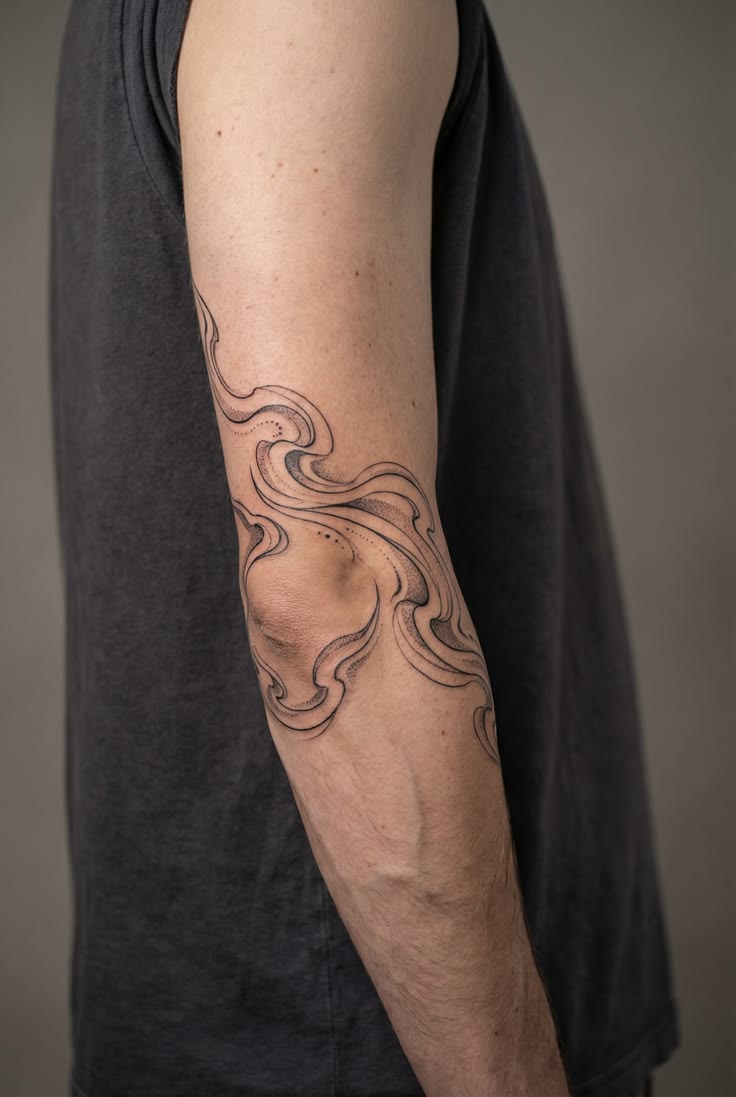 Outer Elbow Tattoo